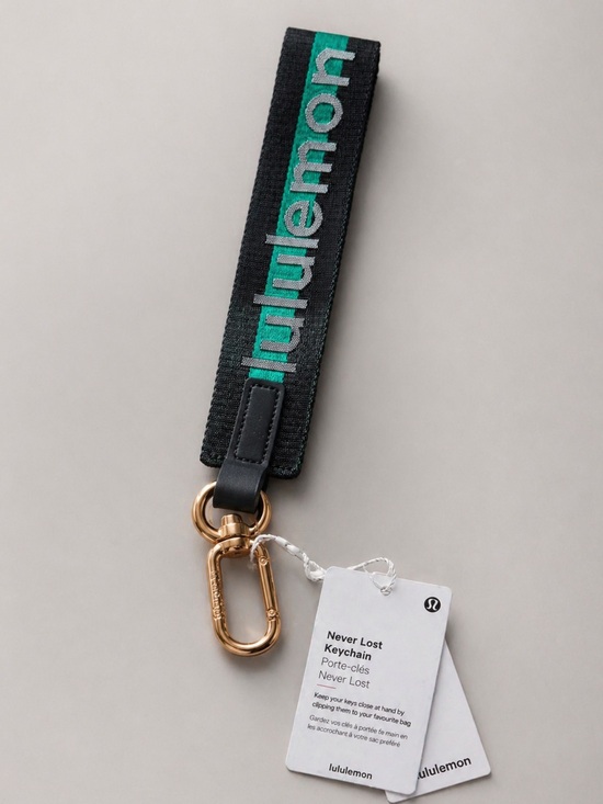 lululemon athletica Accessories - Lululemon Never Lost Keychain NWT green Teal Gold Clip Wristlet Strap Bag Charm